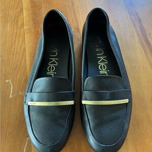 Calvin Klein Black Leather Loafers with Gold Accents